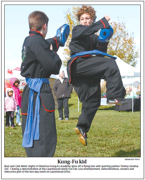 Newspaper clipping - Photograph: WKFA students demonstrating at the Laurelwood Family Fun Fair - Waterloo Chronicle, October 5, 2011.